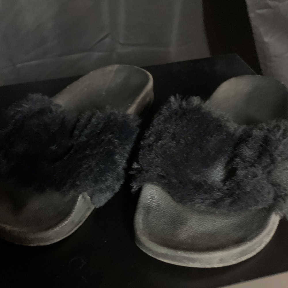 Black furry slip ons